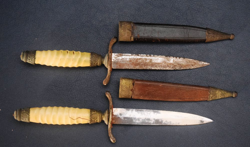 2, Decorative old daggers with leather sheath