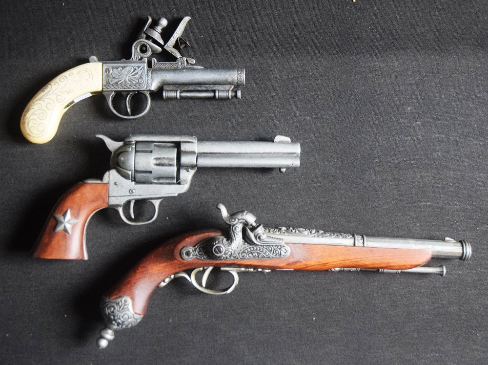 3 Imitation pistols (1Flintlock, 1 revolver and 1 small flintlock pistol)