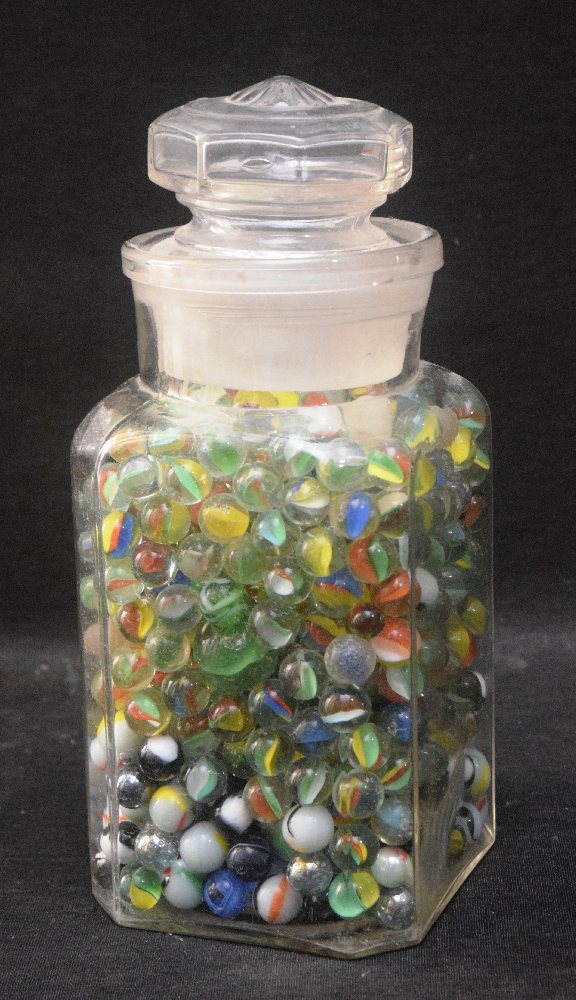 Glass marbles, quantity in a jar