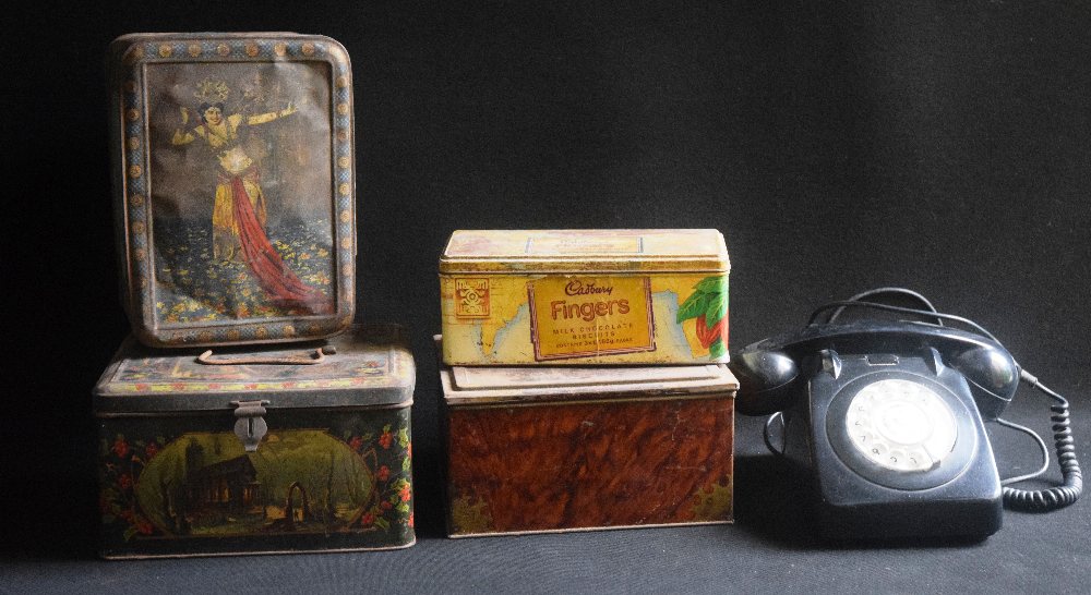Old telephone set; 4 old tin boxes