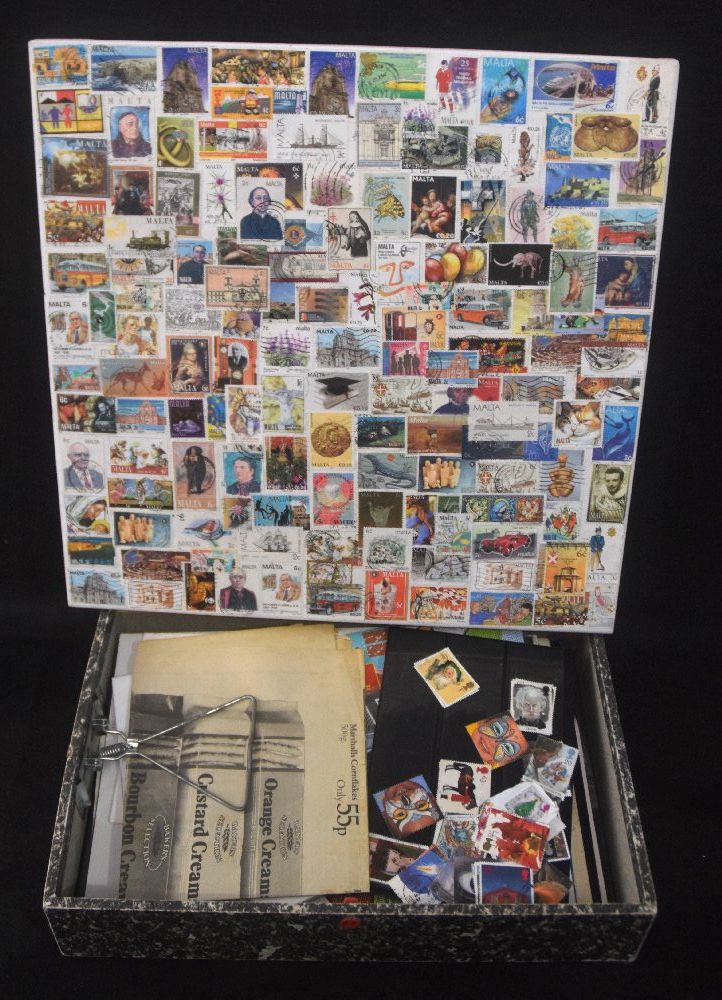 International stamps, large quantity, some pasted on camvas