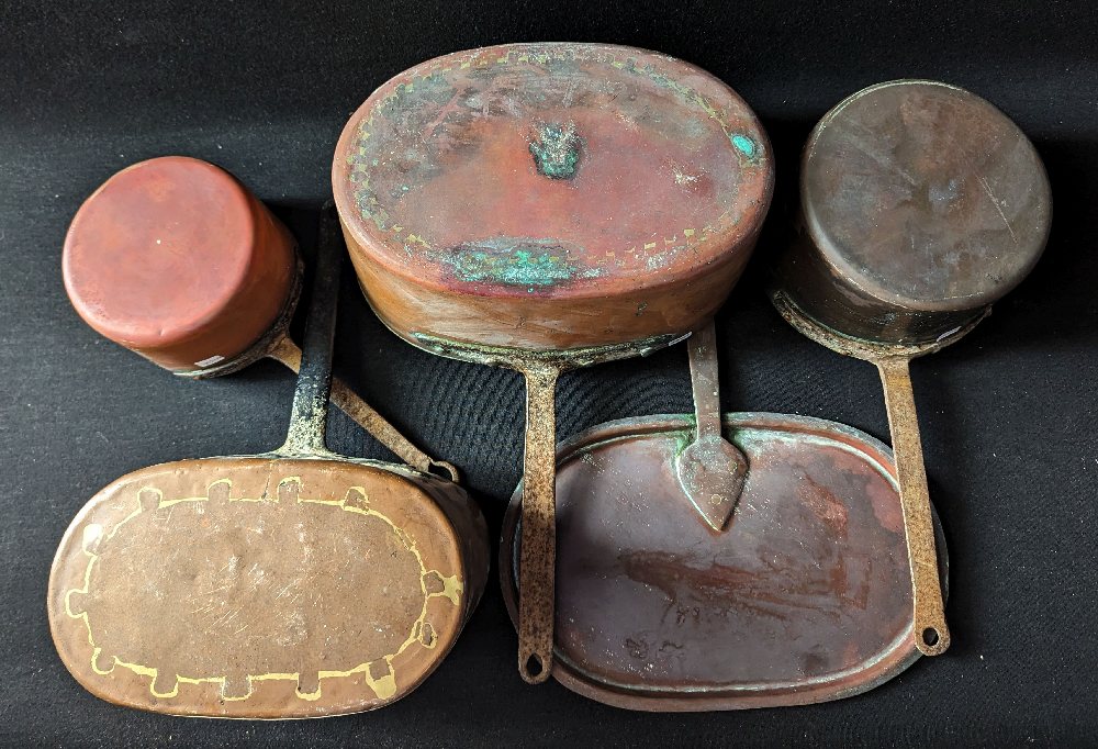 4, 19th C. copper cooking pots and a lid