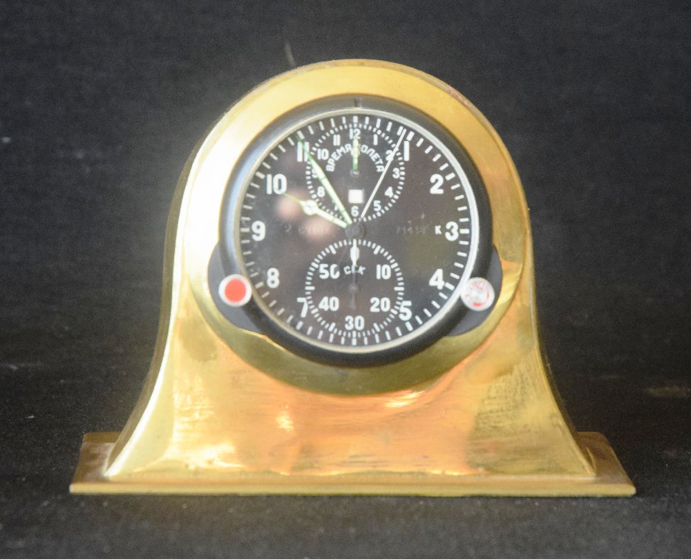 CYTOK Russian MIG aircraft clock, set in a brass case, 17cm