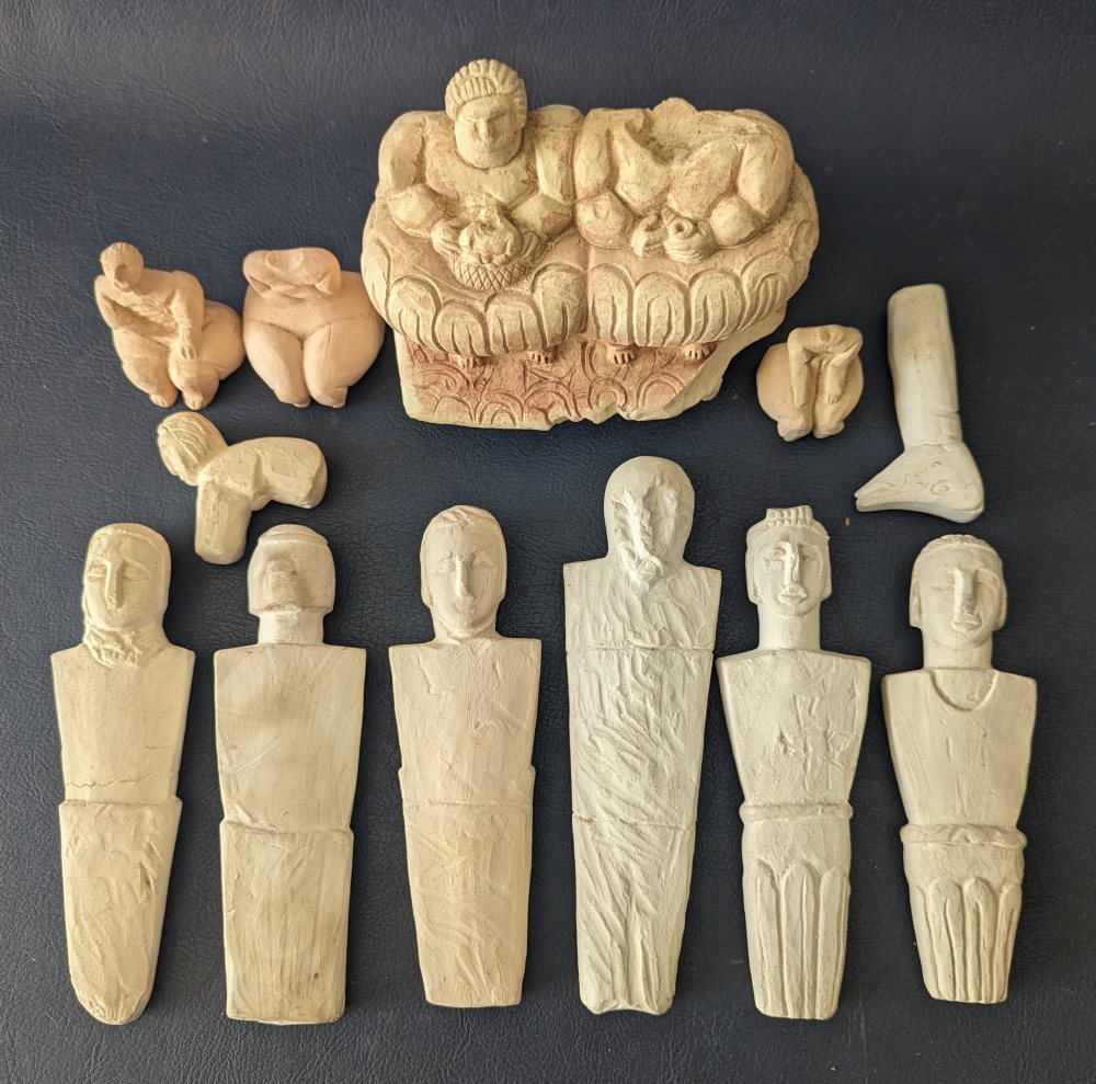 8, Malta limestone carvings (Xaghra Stone Circle copies) and 4 ornamnets