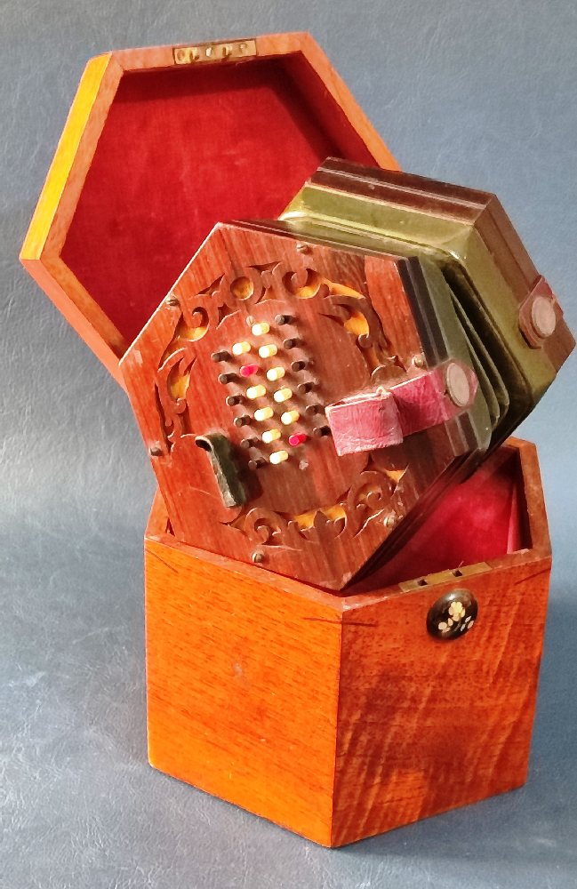 ROCK CHIDLEY Concertina, 48 button, with label, in original hexagon case