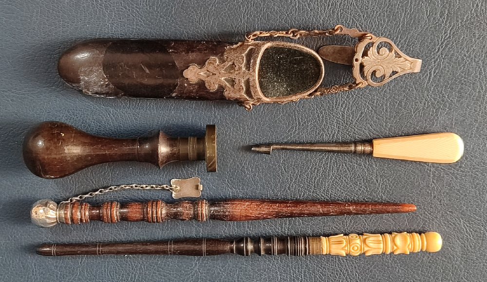 19th C. Fine turned wood spindles with ivory and silver; brass and wood seal; leather and metal moun