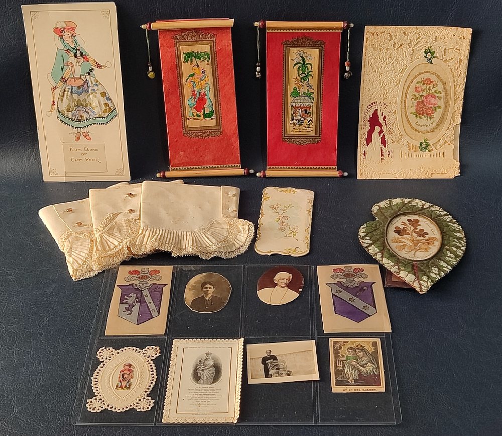 3, Starched linen cuffs with lace edges; 1882 dried pressed flower memento; 2 printed cards; 2 scrol