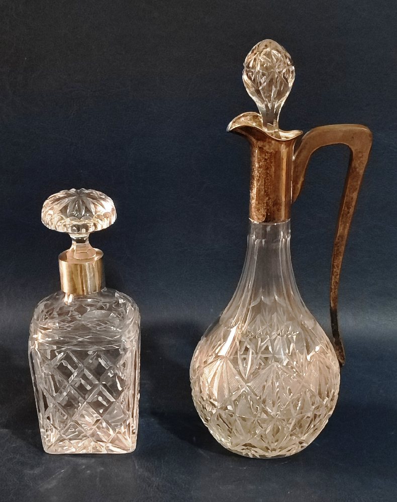 Crystal pineapple cut decanter with stopper, sterling silver neck, and another (2)