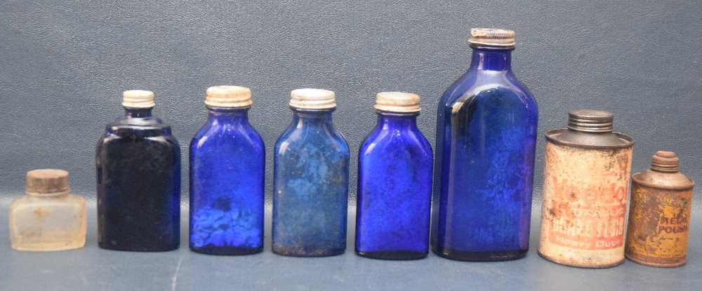 5 Old blue bottles, 2 tins and ink bottle