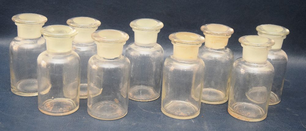 9, Clear glass pharmacy bottles, mid 20th century