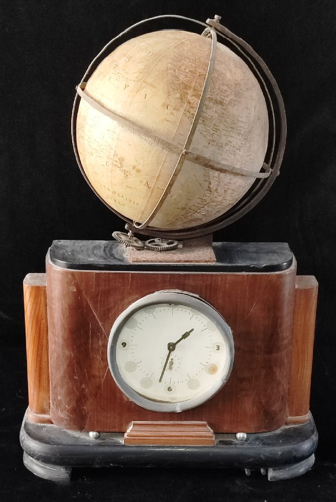 Art Deco electric wall clock with rotating terrestrial globe mechanism