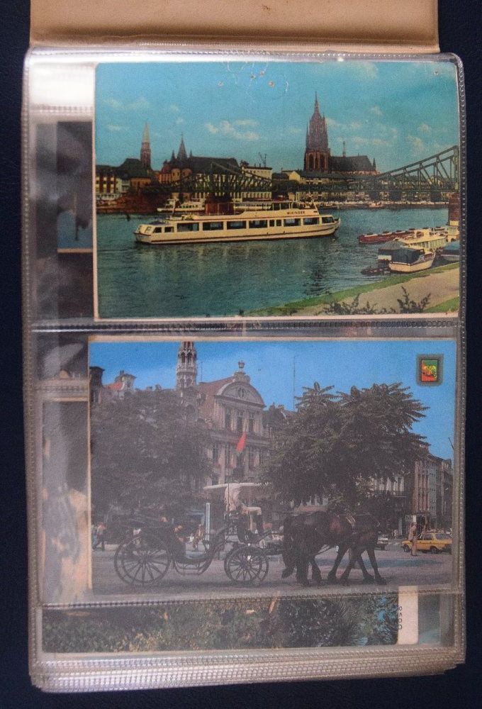 Postcards, foreign, in album (210)