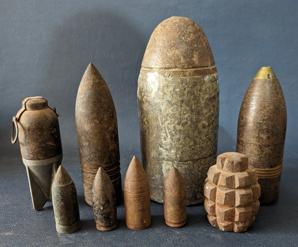 8, WWI & WWII ammunition iron heads, various