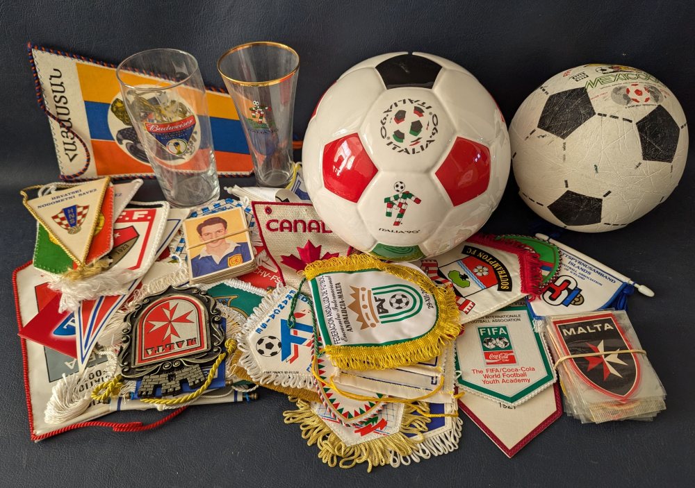 World Cup memorabilia: Ball, ceramic money bank, 2 glasses, pennants etc