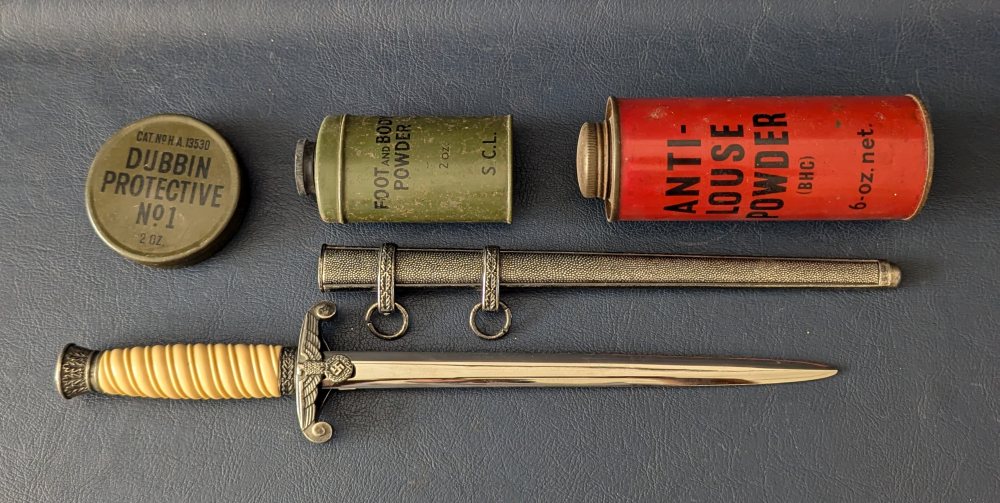 3, Military issue tins and replica dagger