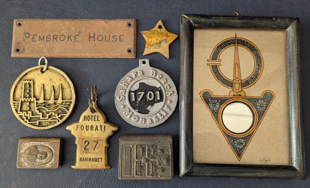 PEMBROKE HOUSE brass plaque; 4 hotel key weights; 2 rosary boxes