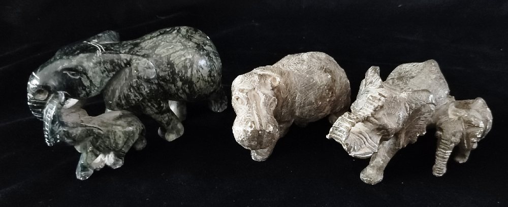 Carved marble elephant and calf, Hippo and another elephant and calf