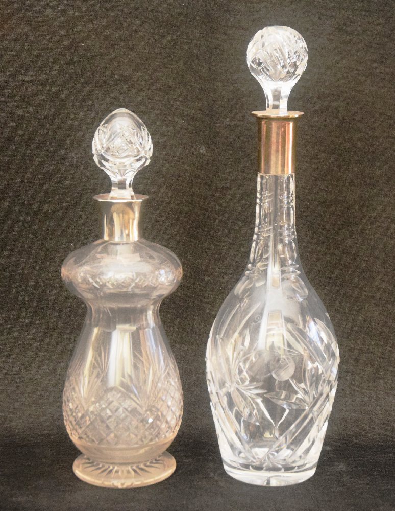 2, Cut crystal decanters with silver collars and stoppers