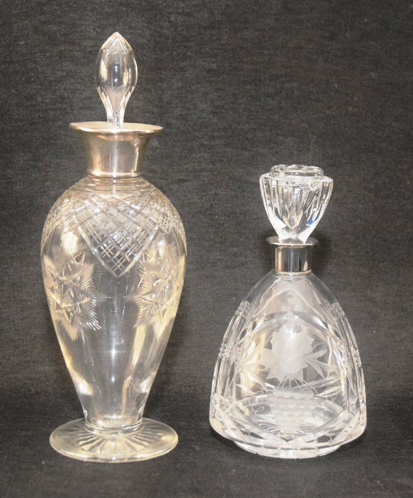 2, Cut crystal decanters with silver collars and stoppers