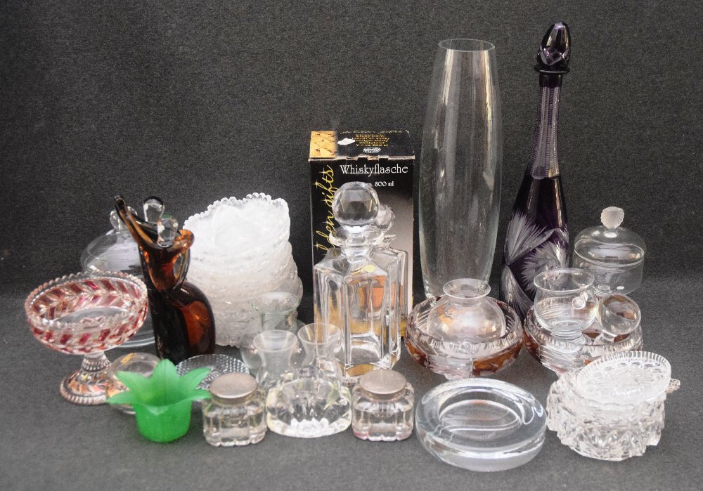 Crystal and glassware: Bowls, vases, candle holder, figure group, decanters, ink wells, nut dishes, 
