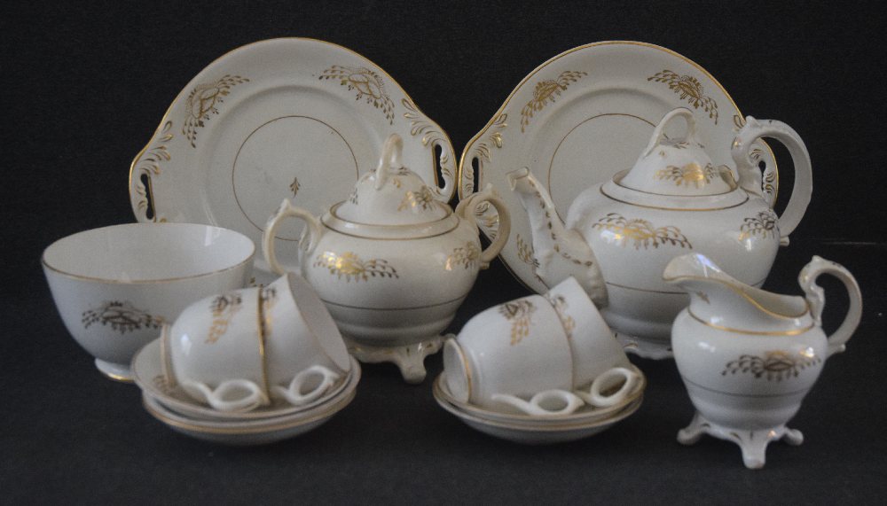 Old china white and gilt tea set,