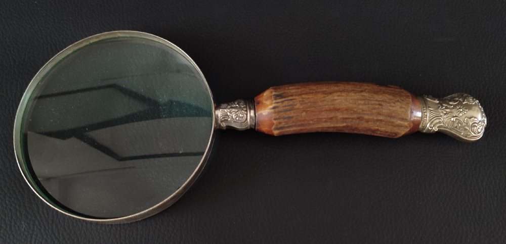 Horn handled magnifying glass with silver plated ornate terminals