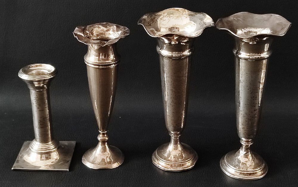 3, Silver spill vases and candle stick, weighted